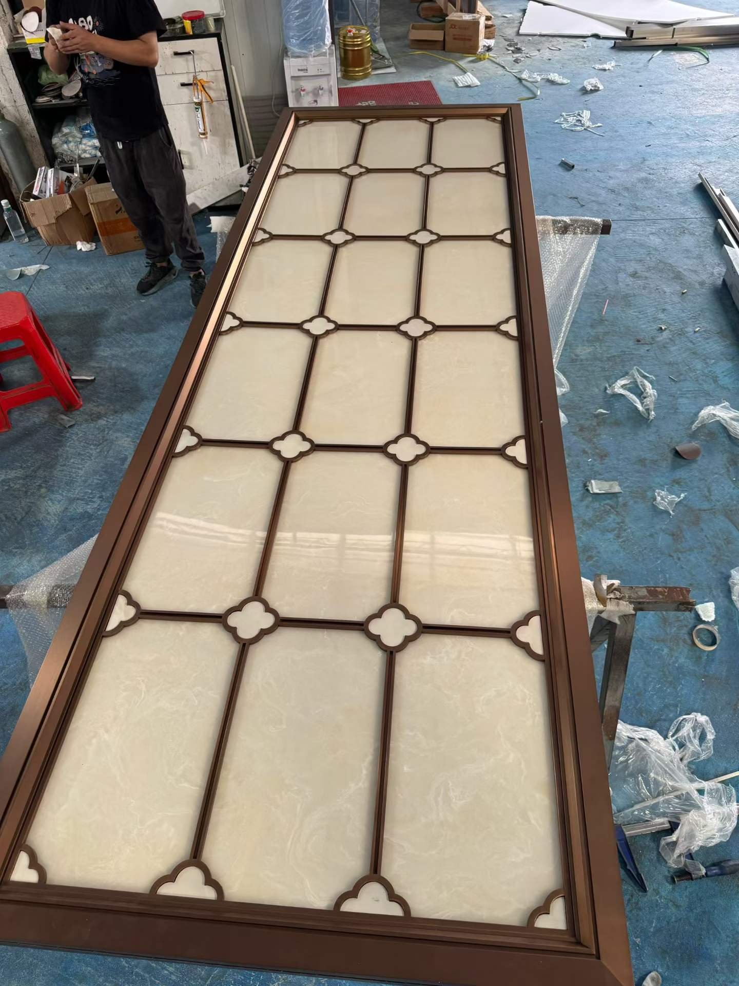 Large warm-tone framed decorative inlay panel